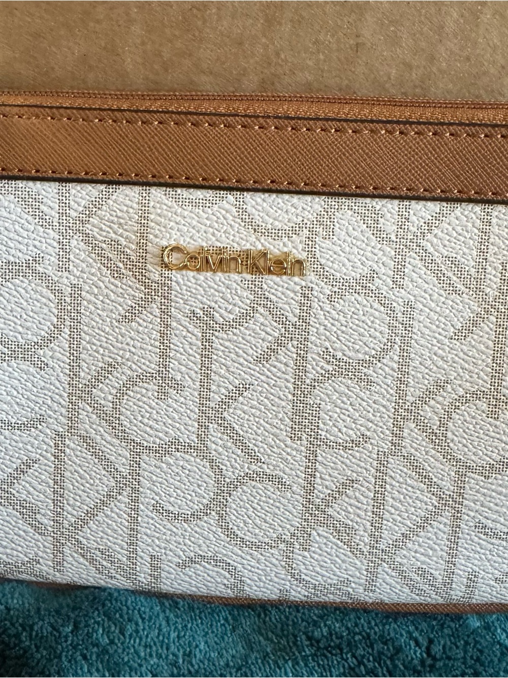 Calvin Klein White & Tan Logo wristlet with Gold Hardware